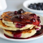 Blueberry lemon pancakes with blueberry syrup