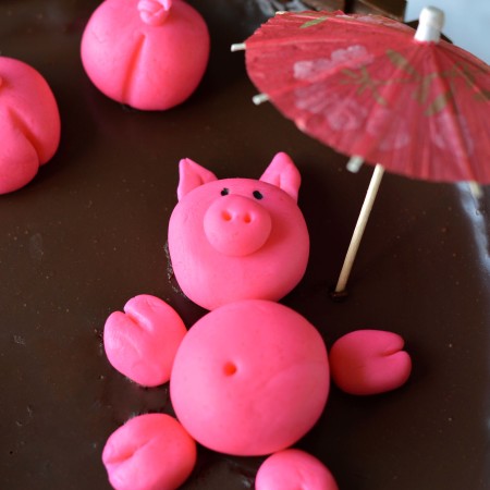 swimming pig cake